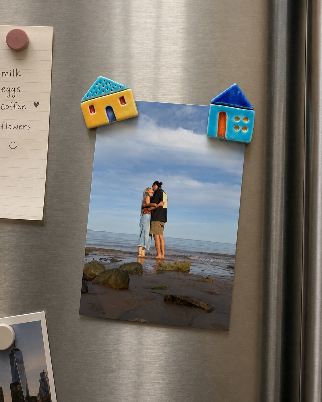Ceramic house magnets on a refrigerator